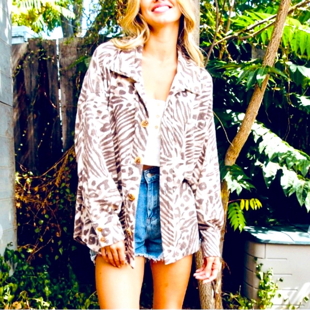 Very cute, comfy Oversized animal print shirt jacket. Best seller!!
